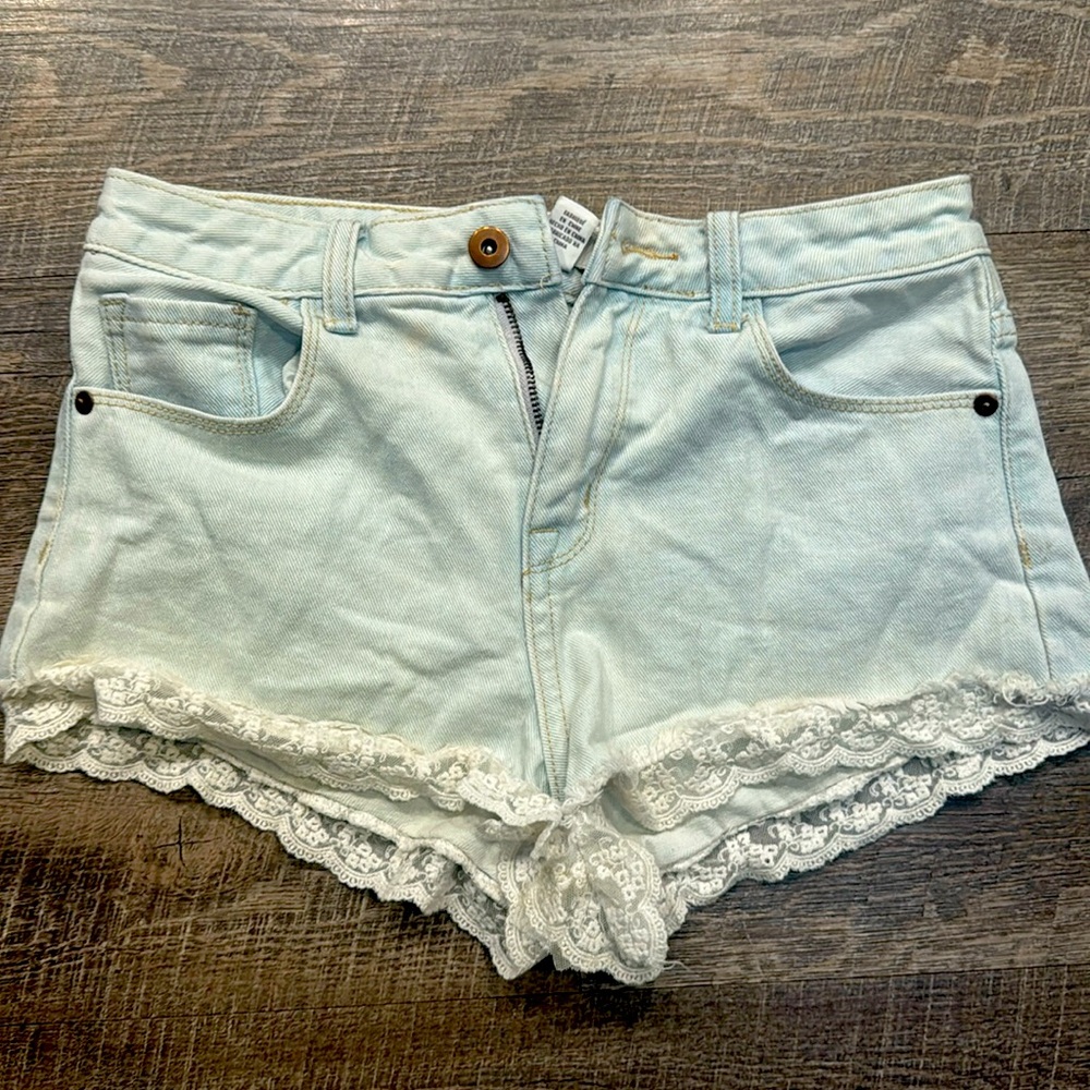 Forever 21 Baby blue jeans size with lace cut off shorts size 25